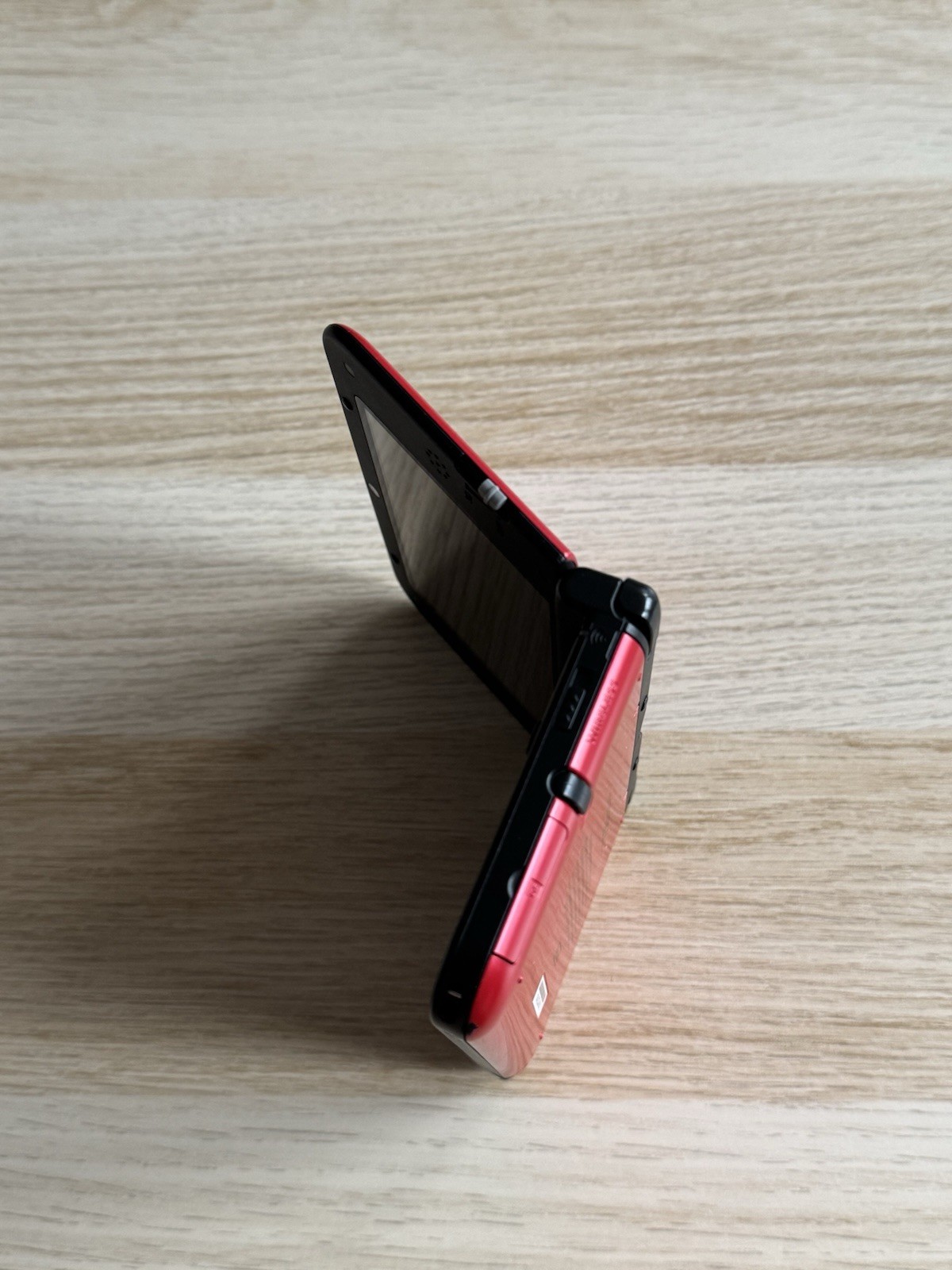 Nintendo 3DS XL Red/Black – Includes Stylus, Case + 3 Games