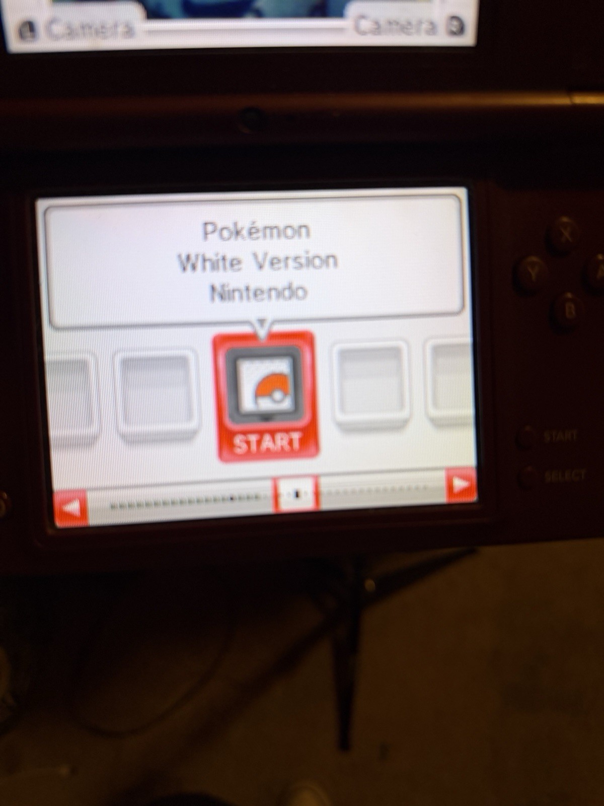 Nintendo DSi XL Handheld System – Burgundy Clean