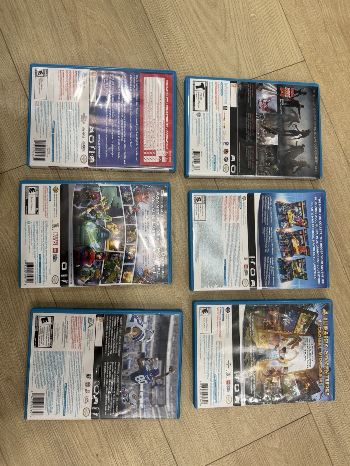 Wii U Bundle Of 6 Video Games: Injustice, Dimensions, Jurassic Park, Super H Etc