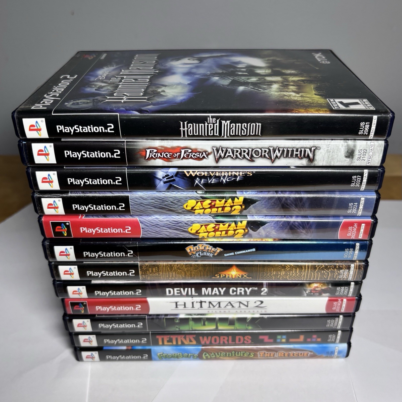 12 PlayStation 2 PS2 Games CIB Tested Lot Ratchet Sphinx Pac-Man Haunted Mansion