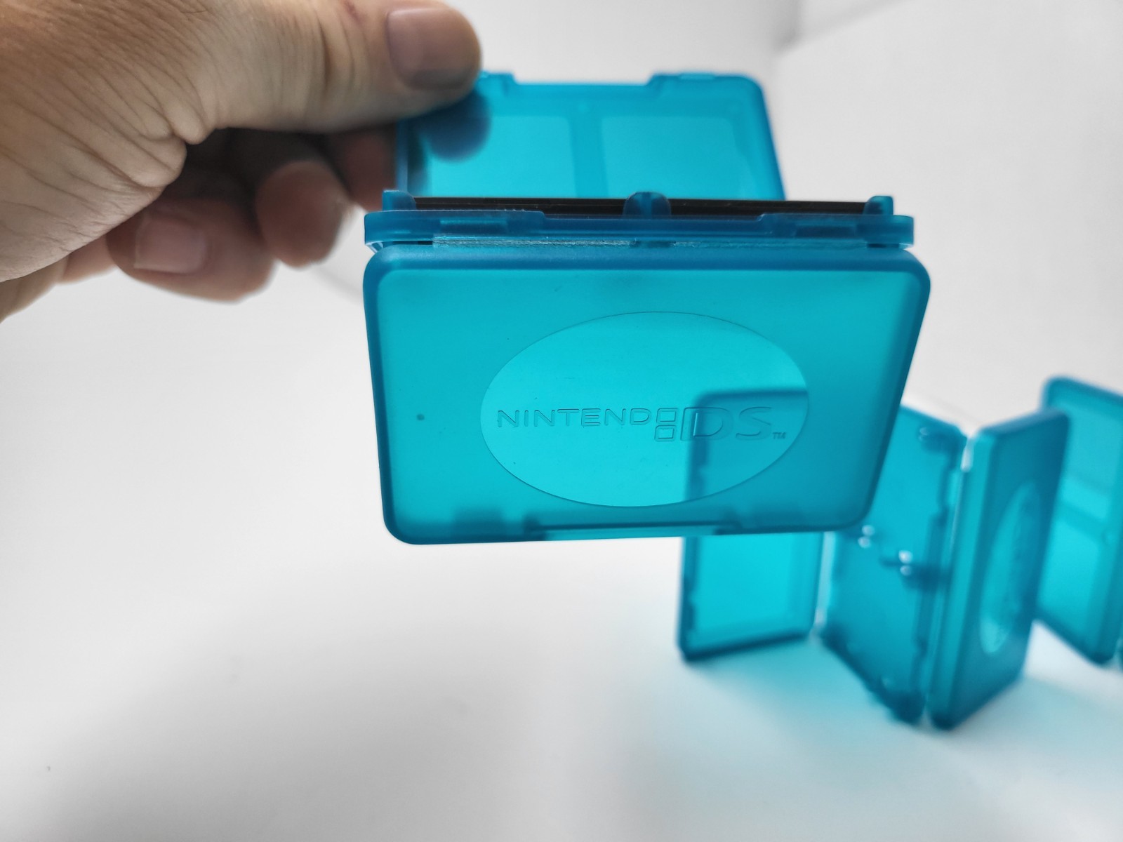 3 NEW OFFICIAL NINTENDO DS CLEAR BLUE 4 GAME CARTRIDGE CASE HOLDER 12 TOTAL #G5