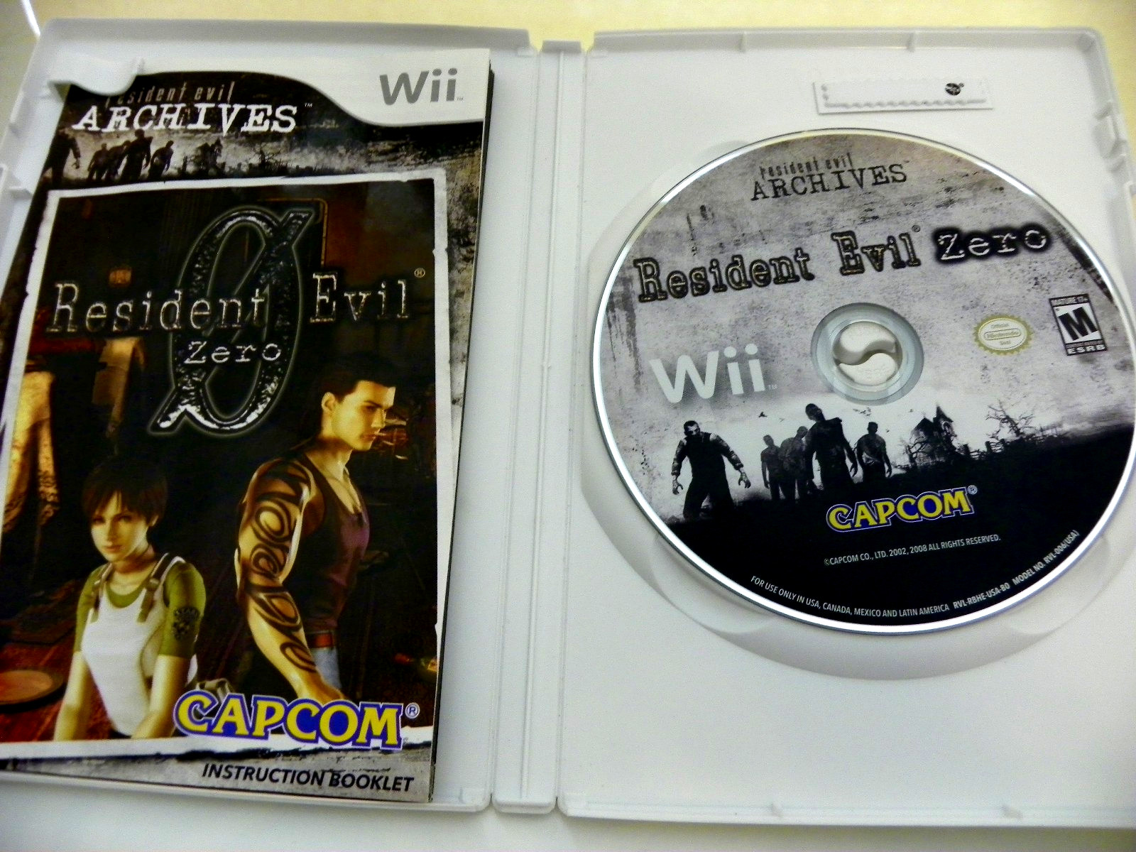 Resident Evil Archives: Resident Evil Zero (Nintendo Wii, 2009) CIB MINT DISK