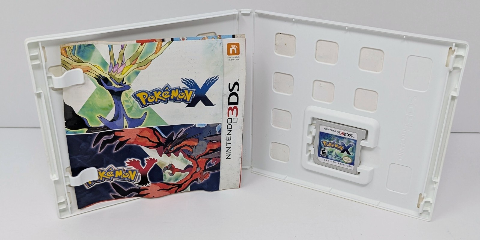 Pokemon X (Nintendo 3DS, 2013) Complete – Tested – Water Damage
