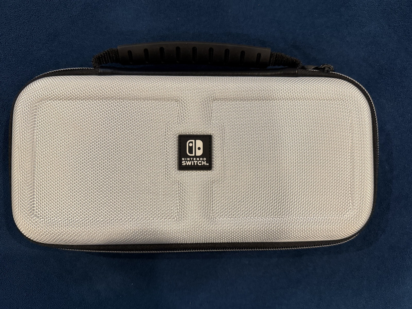 Nintendo Switch Oled Edition (Comes w/ charging stand, carrying case and Game)