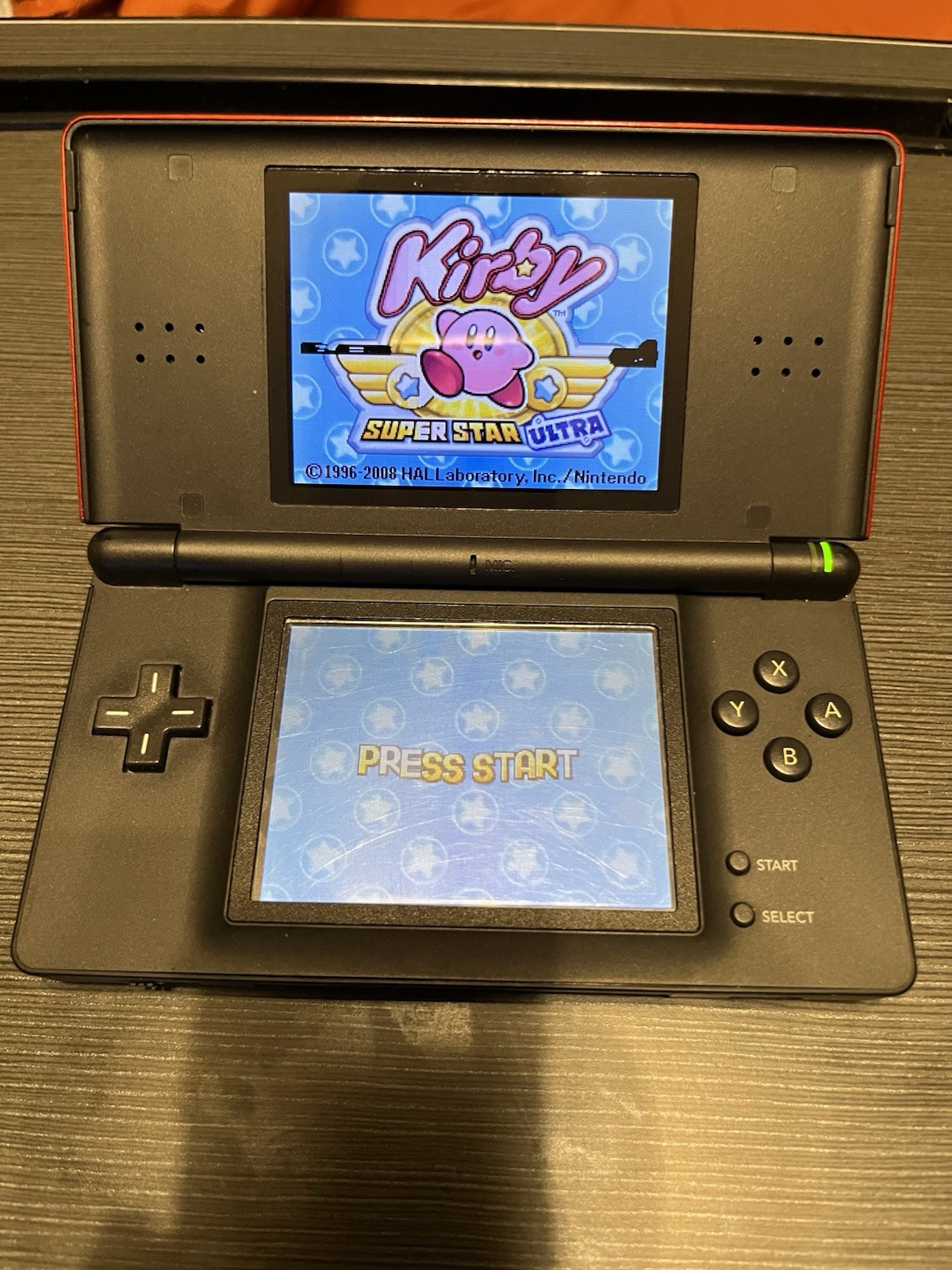 Nintendo DS Lite Red/Black W/ 2 Games, Some Pixels On Screen Isn’t Working