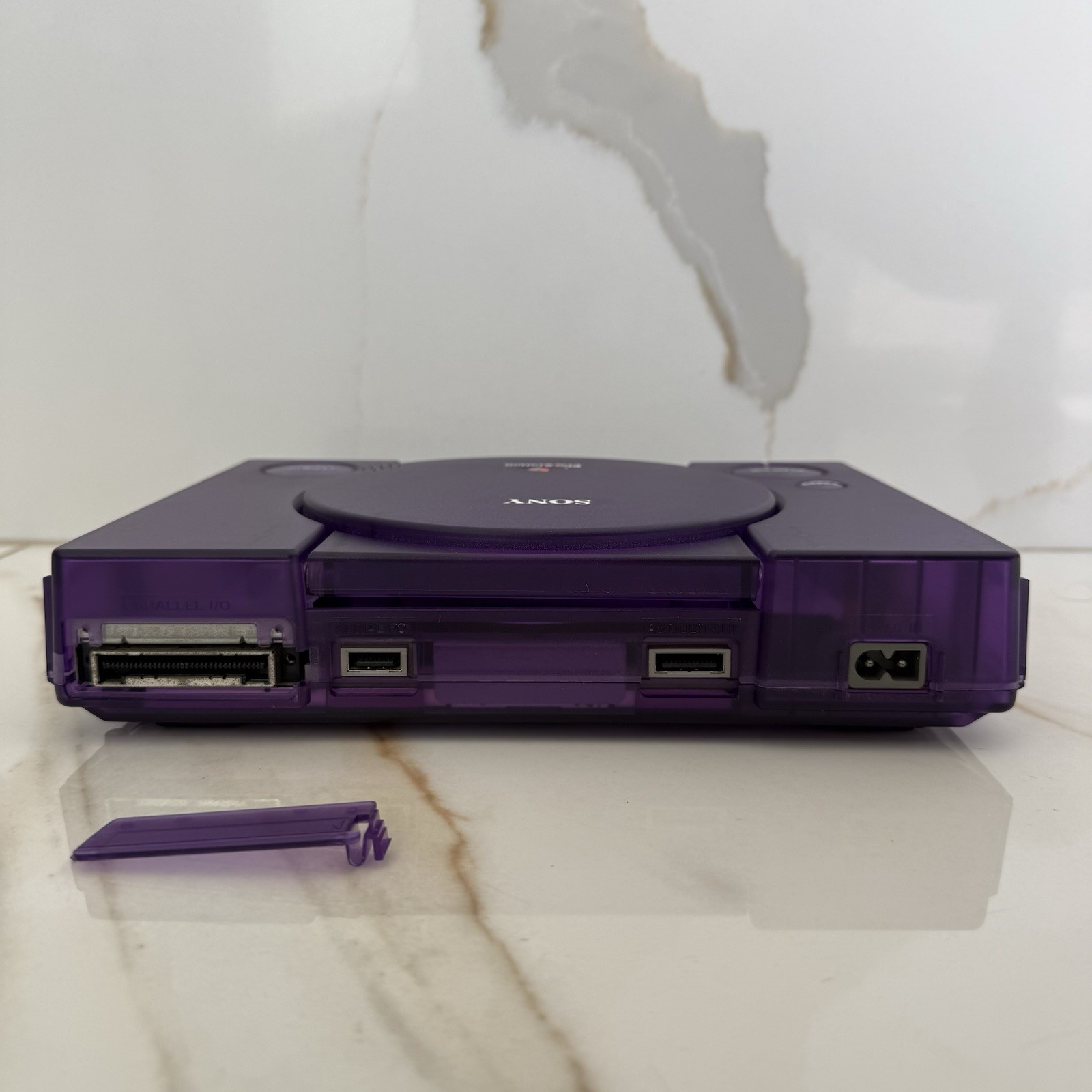 Sony PlayStation 1 Console (SCPH-5501) Bundle – Translucent Clear Purple Shell