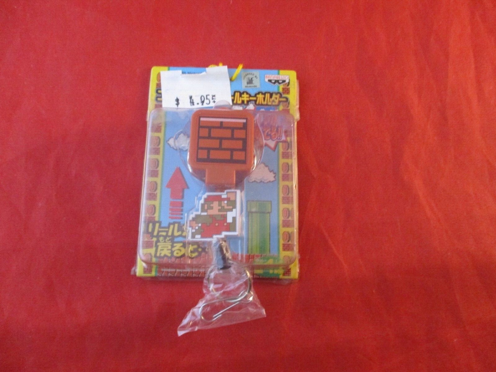 Small Mario Nintendo Retractable ID Holder Keychain w/Popup Coin NES Mario Look