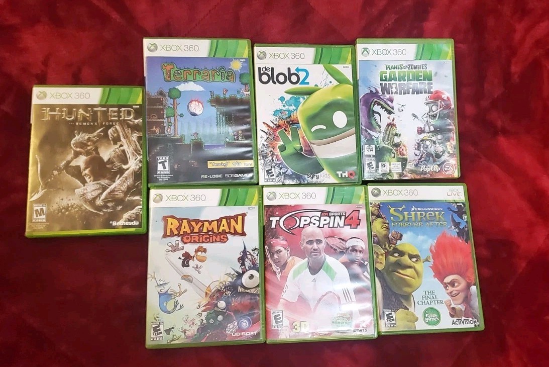 Lot of 7 Xbox 360 games Shrek Terraria Rayman Origins Hunted De Blob 2, Top Spin