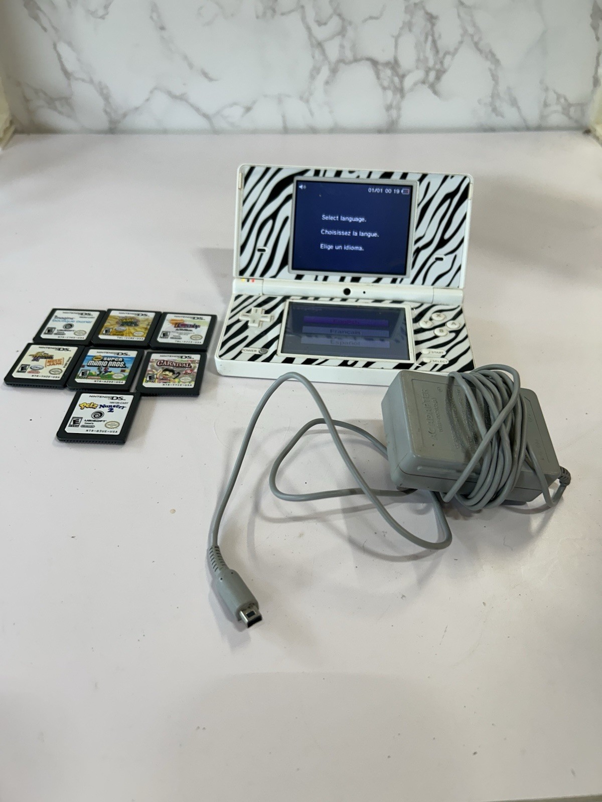 Nintendo DSi White With Print Cover Handheld System with 7 Games
