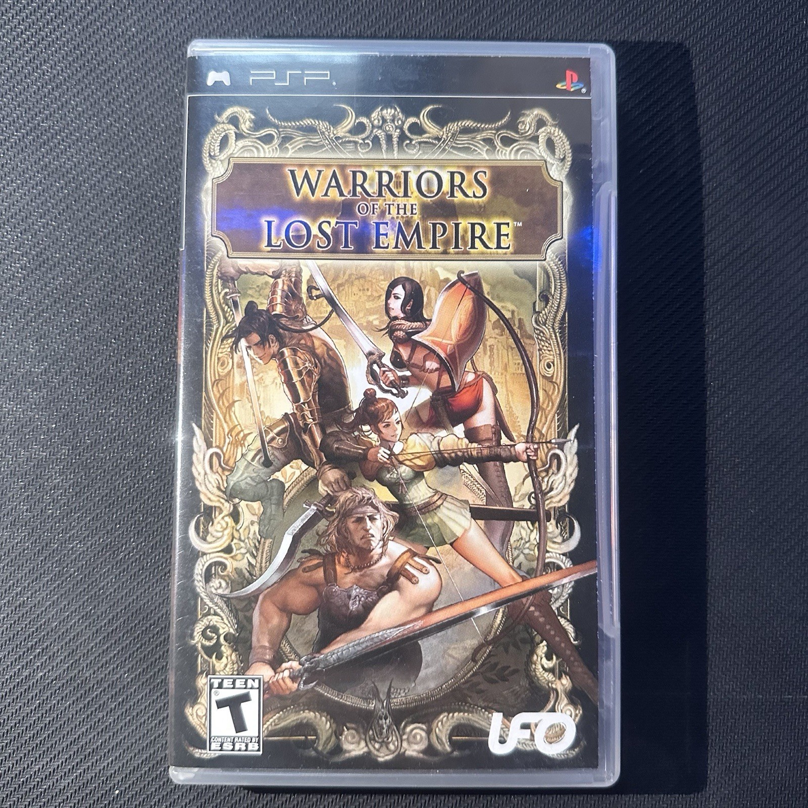 UFO Interactive Warriors of the Lost Empire Sony PSP Manual Included Hack-N-Sla…