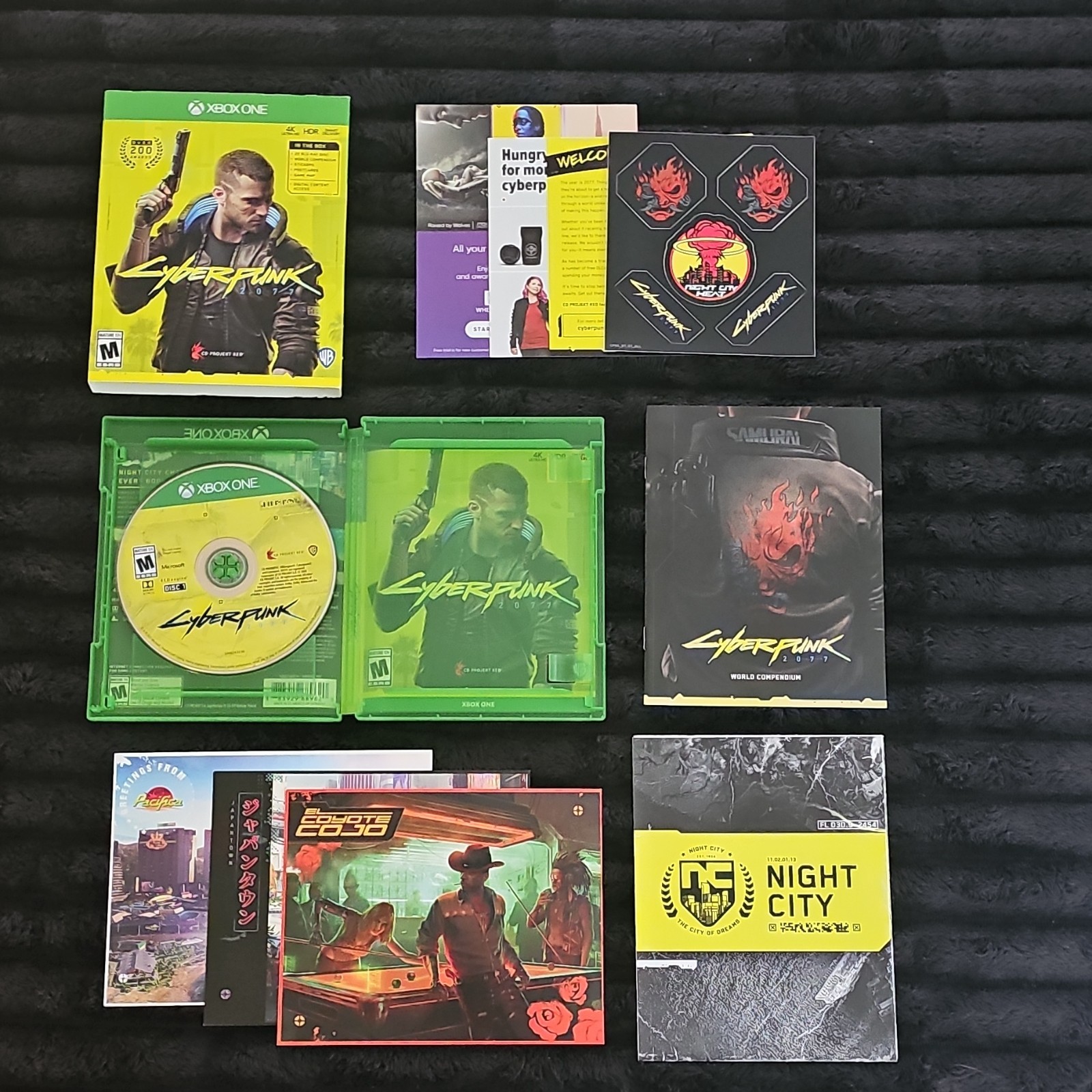 Cyberpunk 2077 (Xbox One) with World Compendium, Stickers, Post Cards, World Map