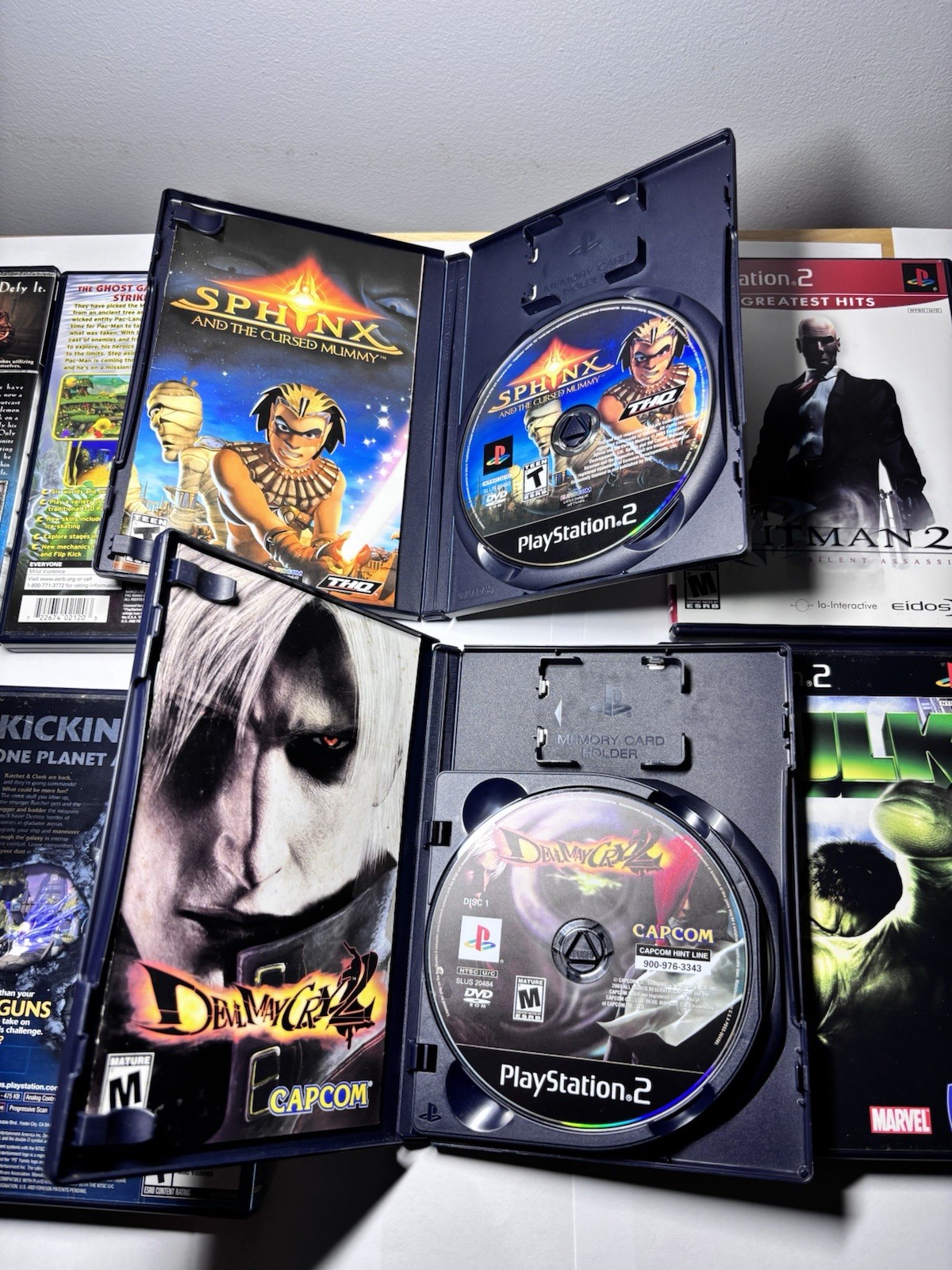 12 PlayStation 2 PS2 Games CIB Tested Lot Ratchet Sphinx Pac-Man Haunted Mansion