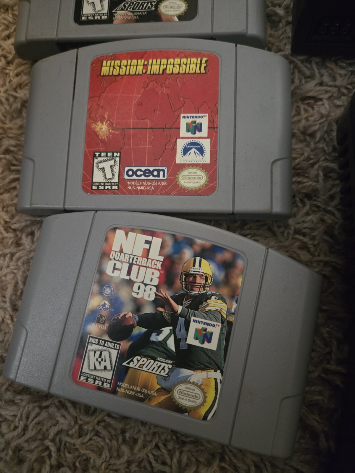 Nintendo 64 console with 8 games and 2 Controllers N64 KEN GRIFFEY WWF