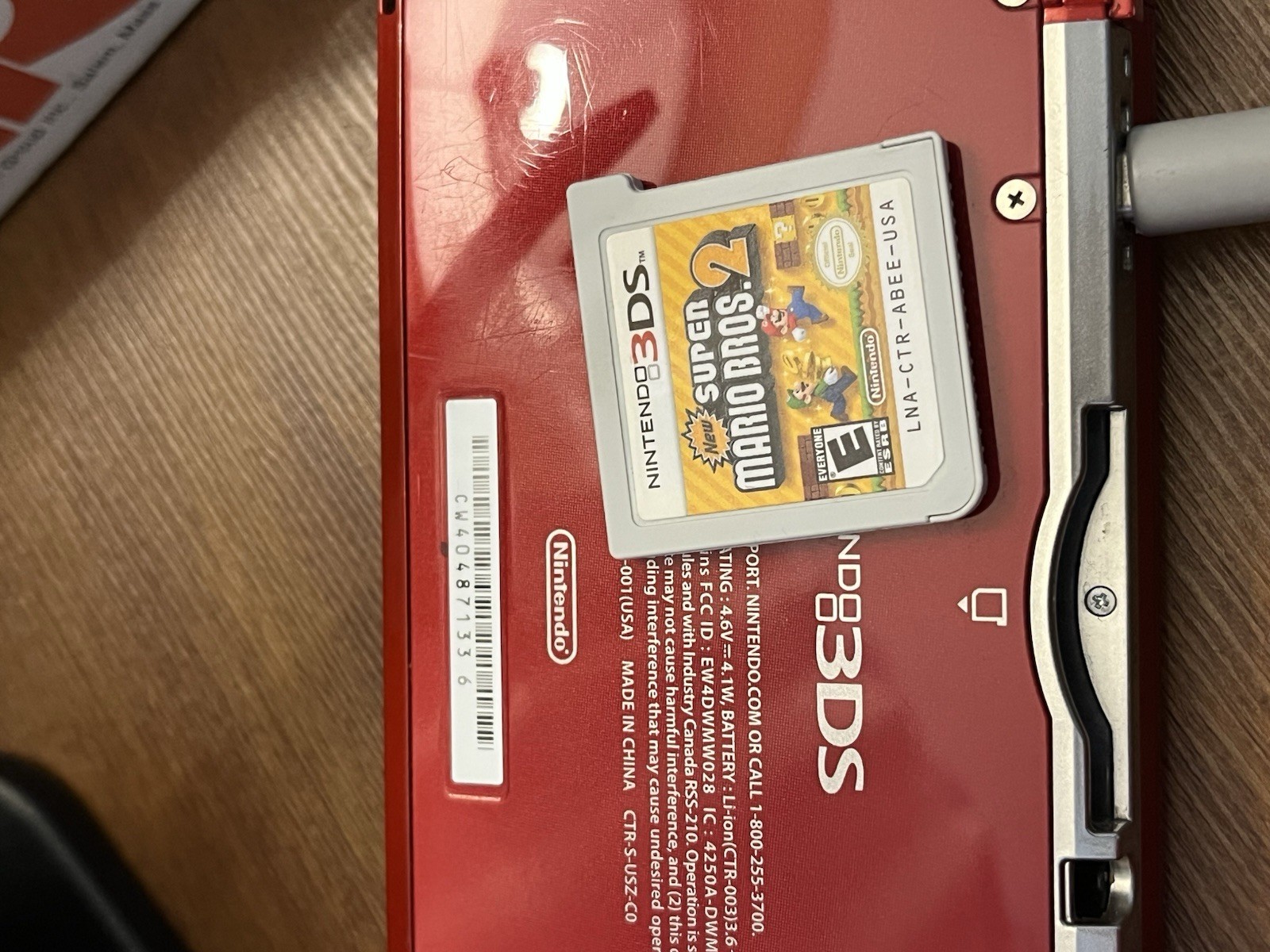 Nintendo DS 3DS in Red with Mario Case and Super Mario Maker Game