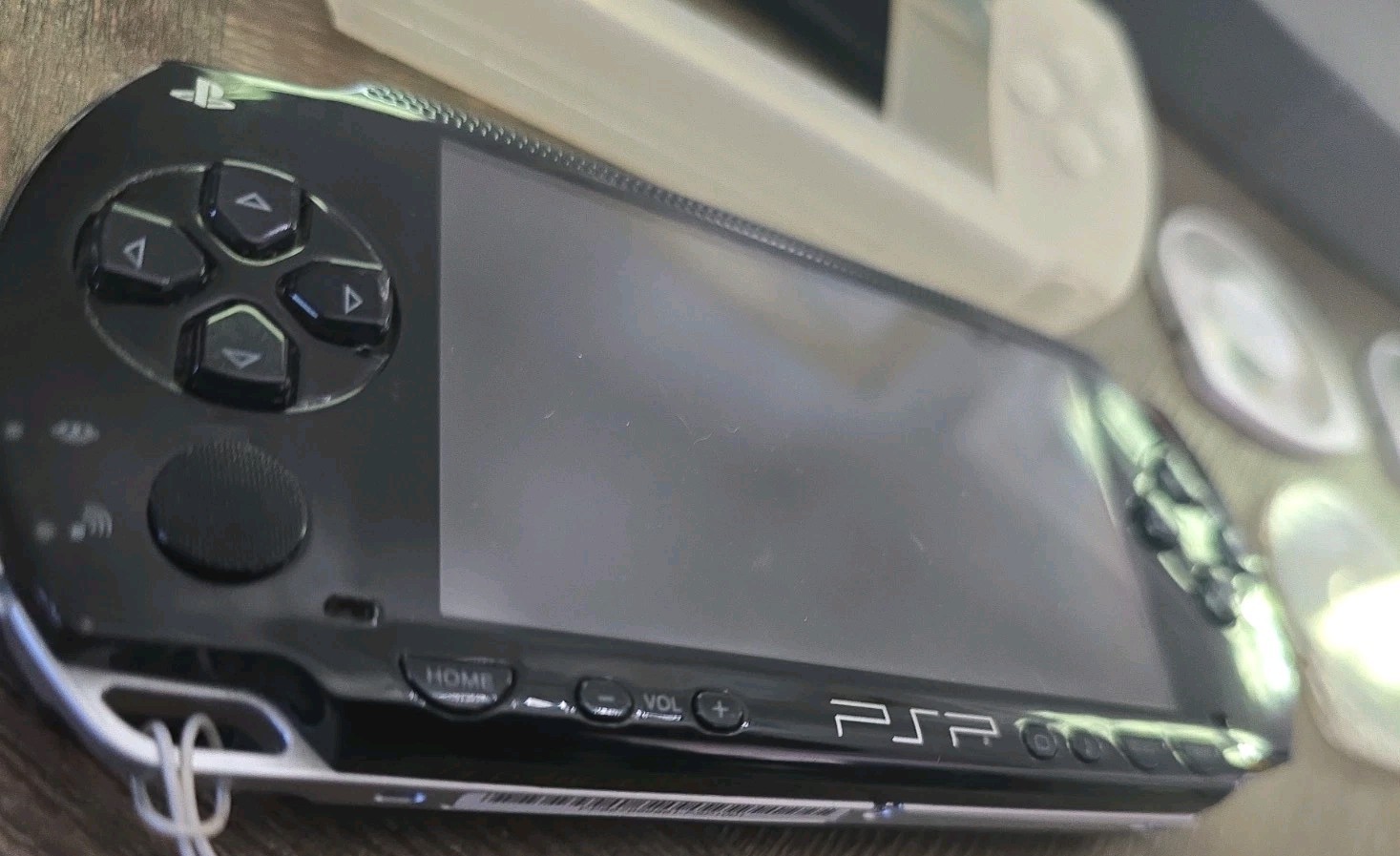 Sony PSP-1001 Black Handheld System, Charger, Memory Cards, And Cases. Read !!