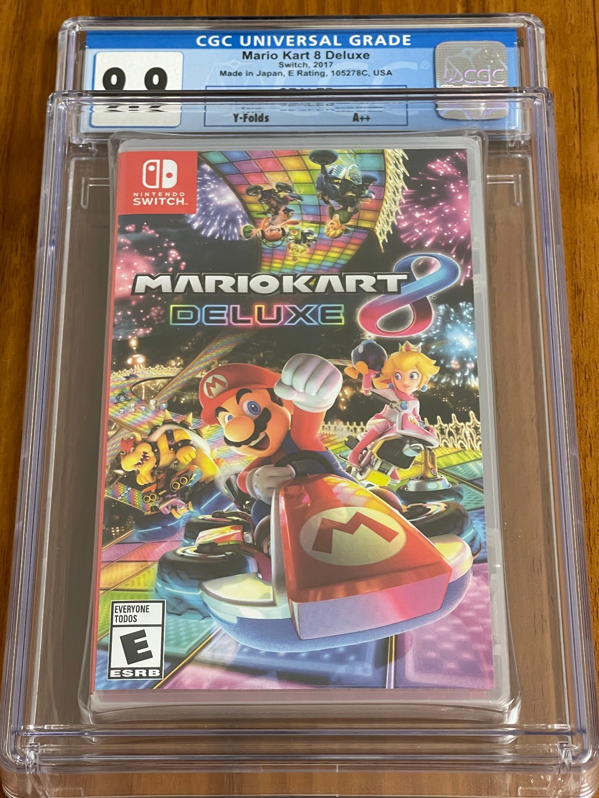 NEW SEALED ENCASED 2017 SWITCH MARIO KART 8 DELUXE CGC Graded 10 Y-Fold A++