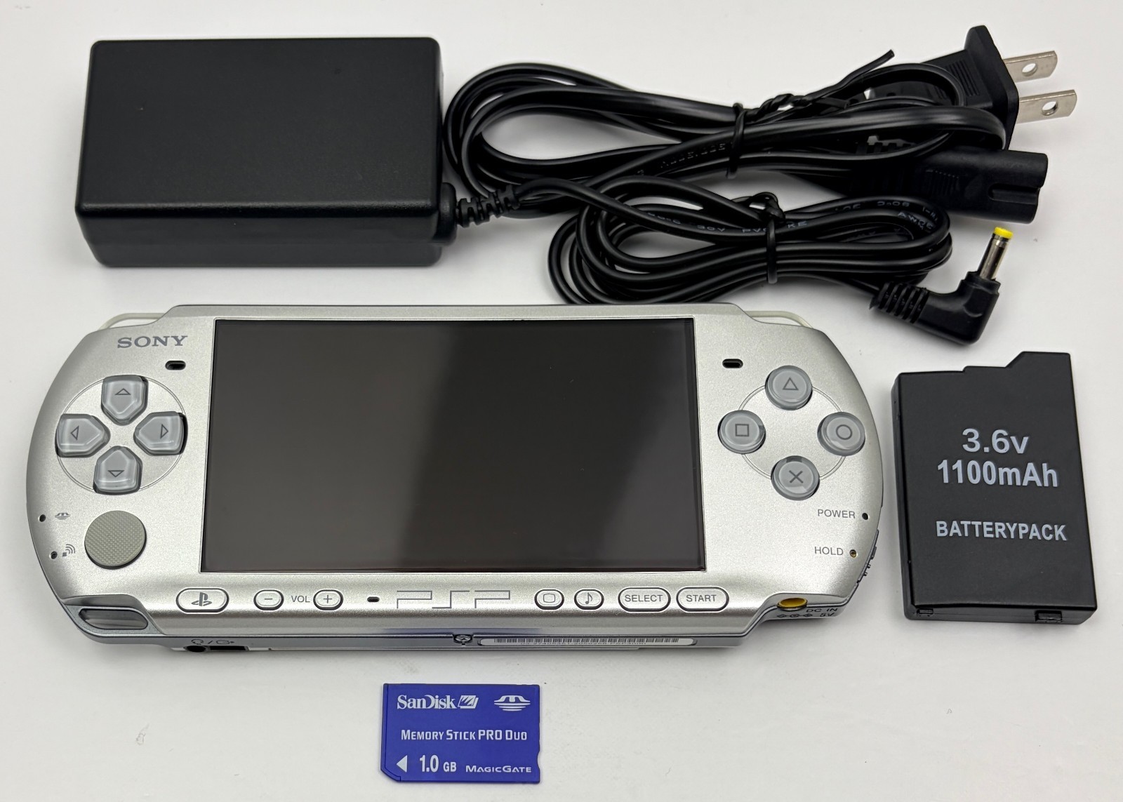 Sony PSP 3000 Mystic Silver Handheld w/ NEW Battery, Charger, & 1GB Memory Card