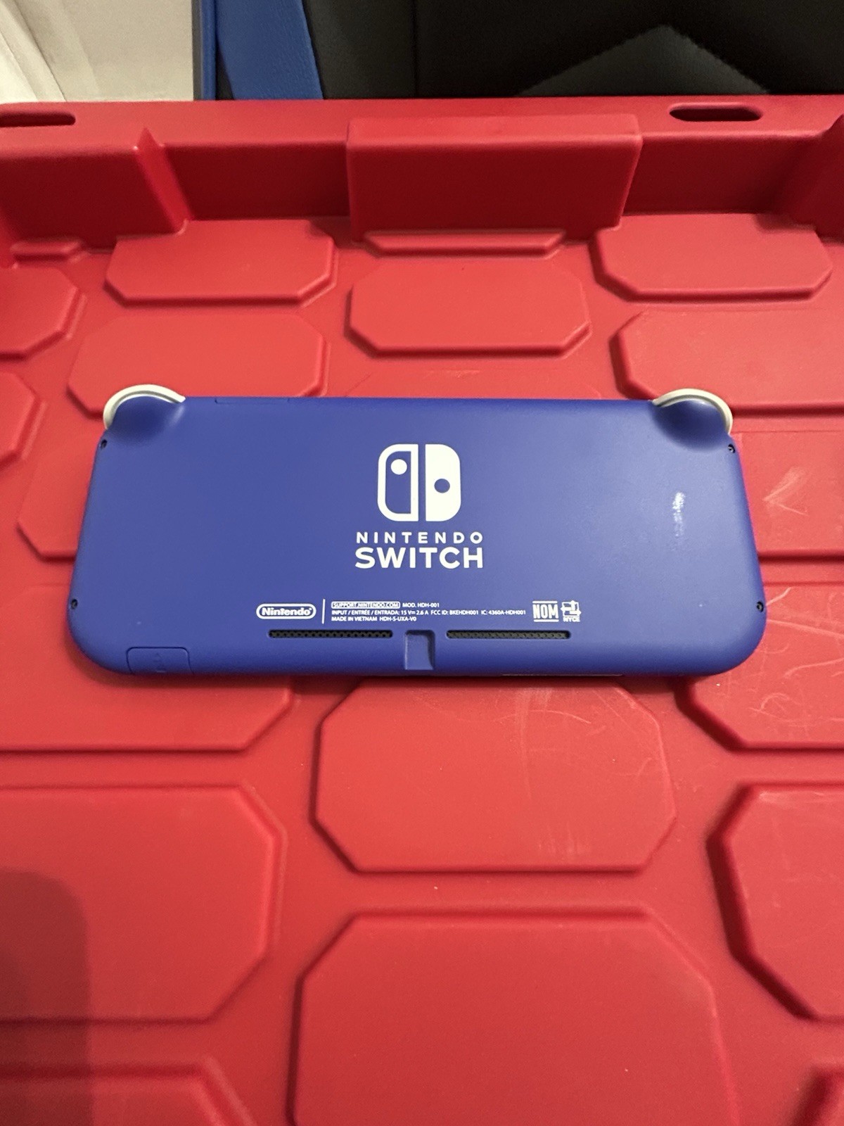 Nintendo Switch Lite (Blue) + Grip Case + Mario Kart 8 Deluxe Game