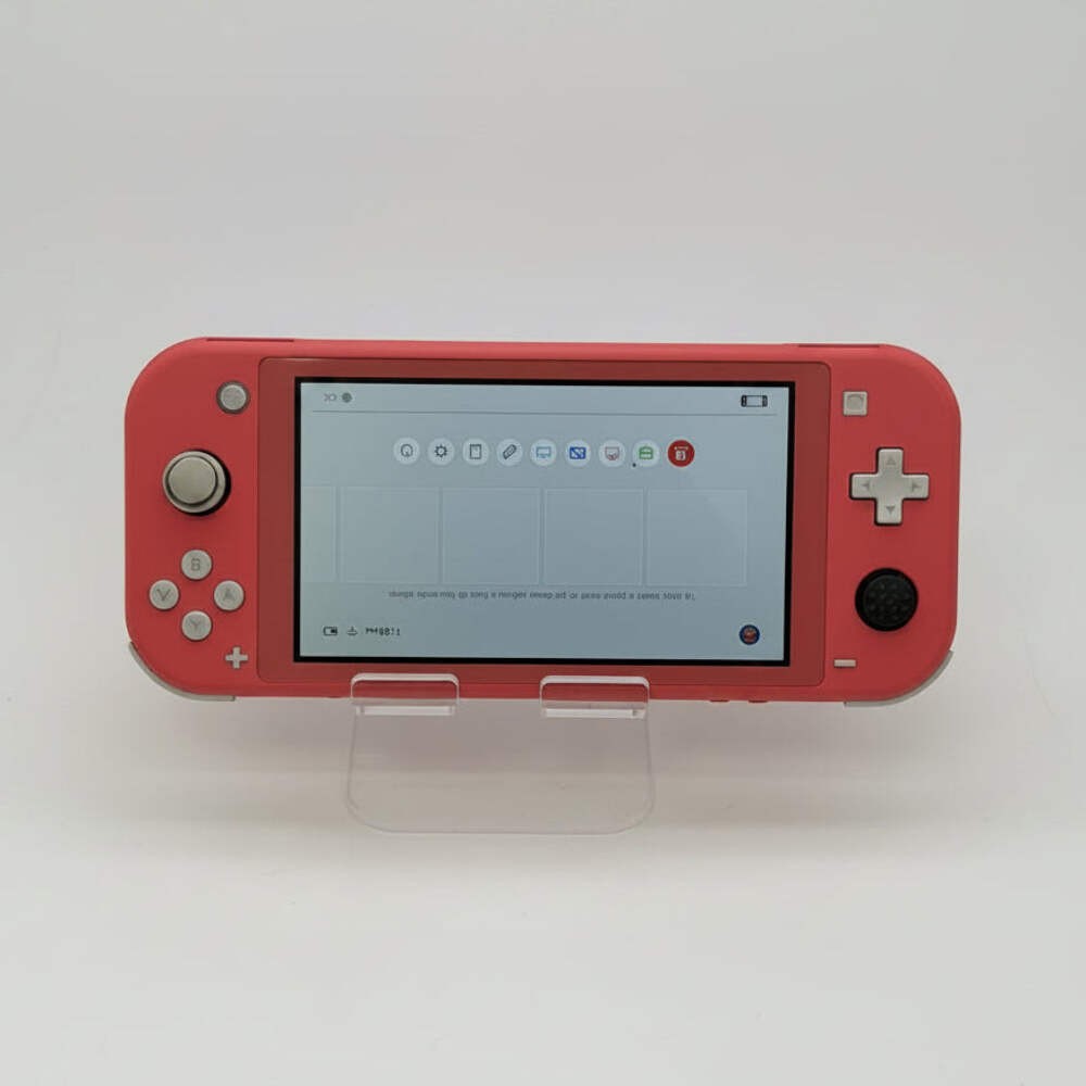 Nintendo Switch Lite Coral Handheld Video Game System Pink & Minecraft Game