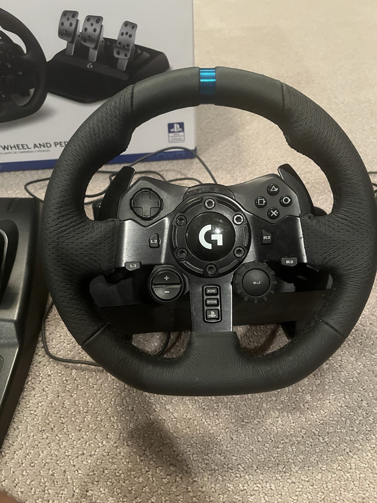 Logitech G923 Racing Wheel with Pedals, feels brand new.