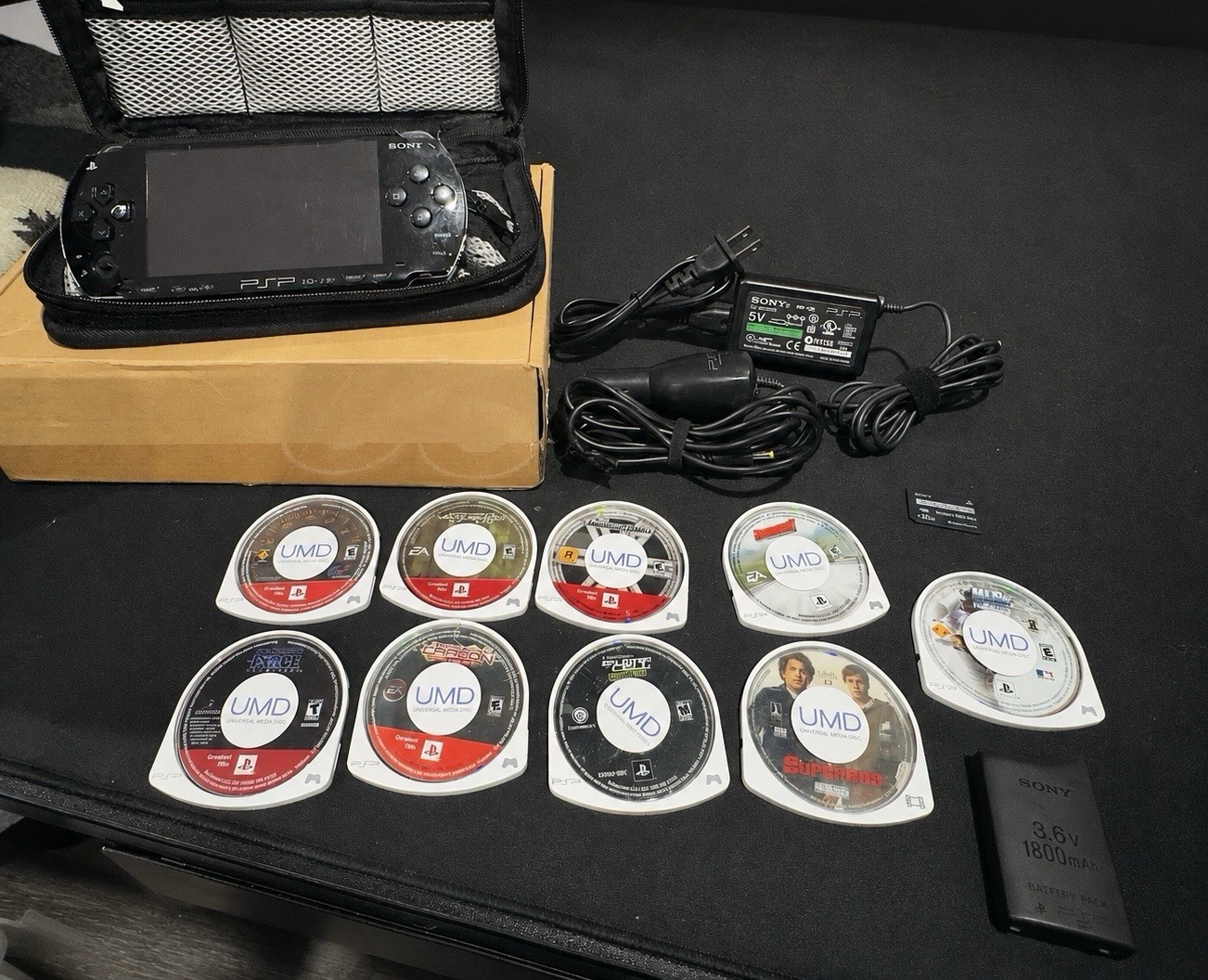 Sony PSP-1001 Black Console & 8 Games Bundle