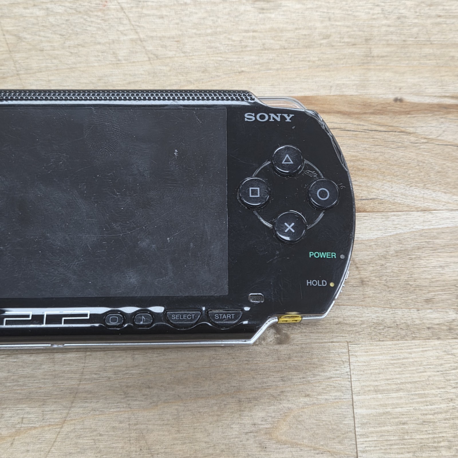 Sony PSP-1001 PlayStation Portable – Black with 8gb Memory Stick Duo & Pwr Cable