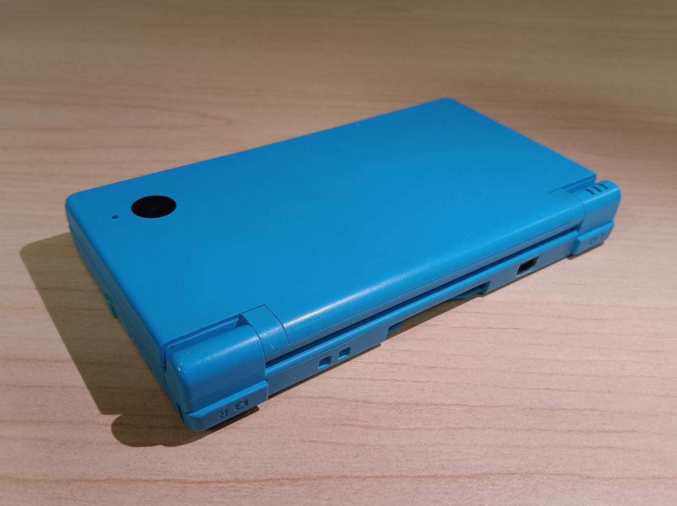 Nintendo DSi light blue console bundle w/ 5 games & charger- Tested