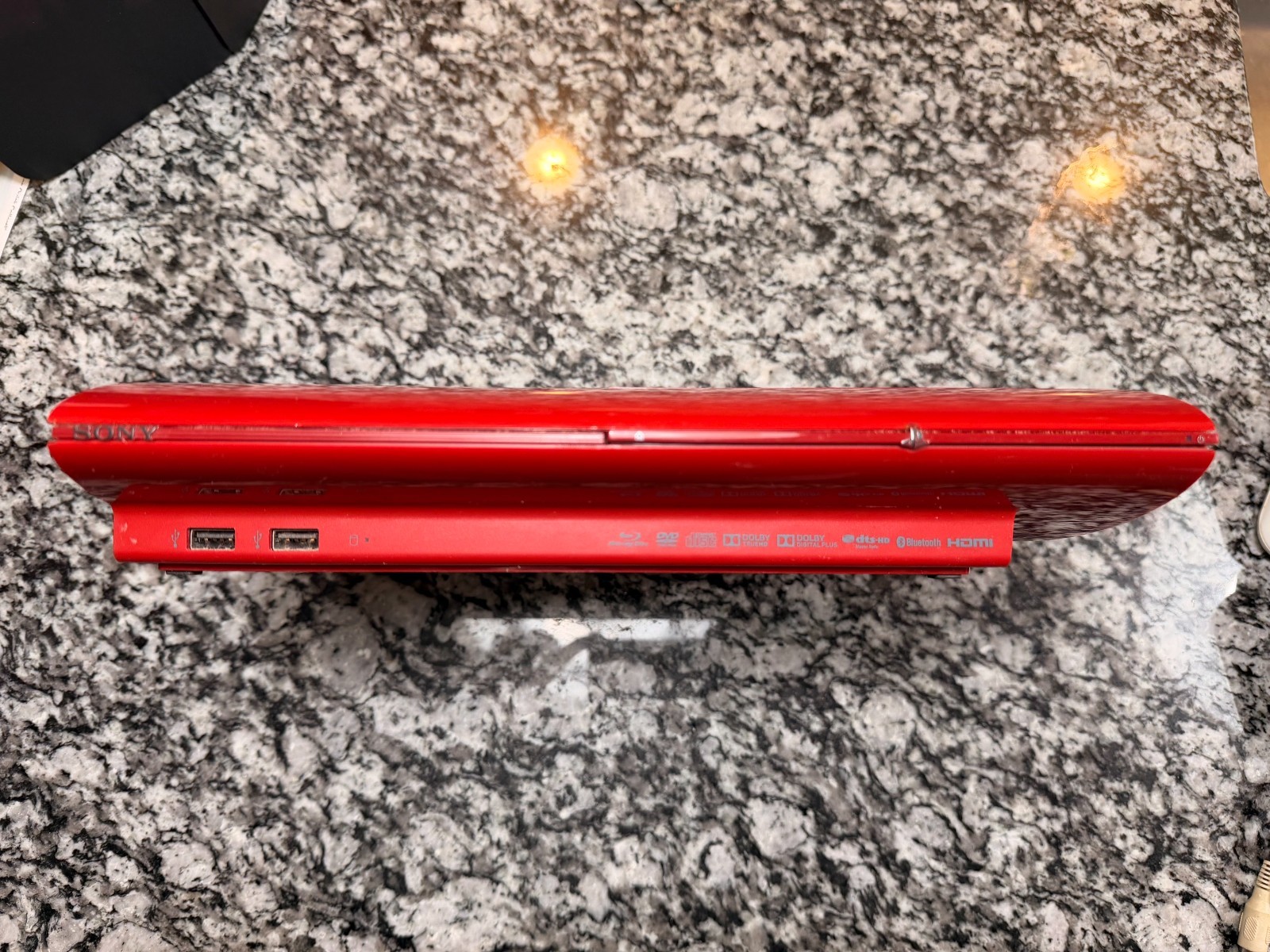 Sony PlayStation 3 Slim 500GB Garnet Red Edition Console with controllers