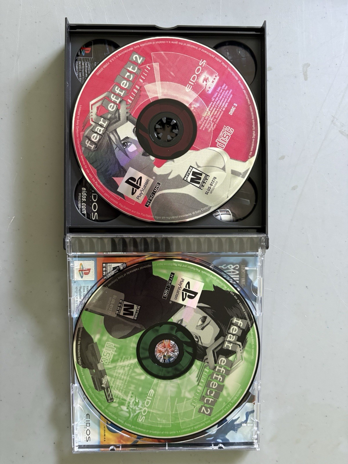 Eidos Fear Effect 2: Retro Helix (Sony PlayStation 1) CIB M Mature