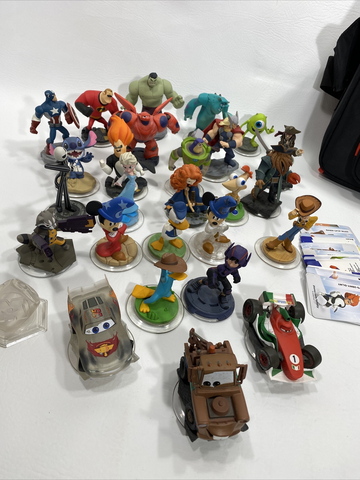 Disney Infinity Lot Of 26 Figures, XBOX Game 2.0, Roll Out Shoulder Bag, Cards