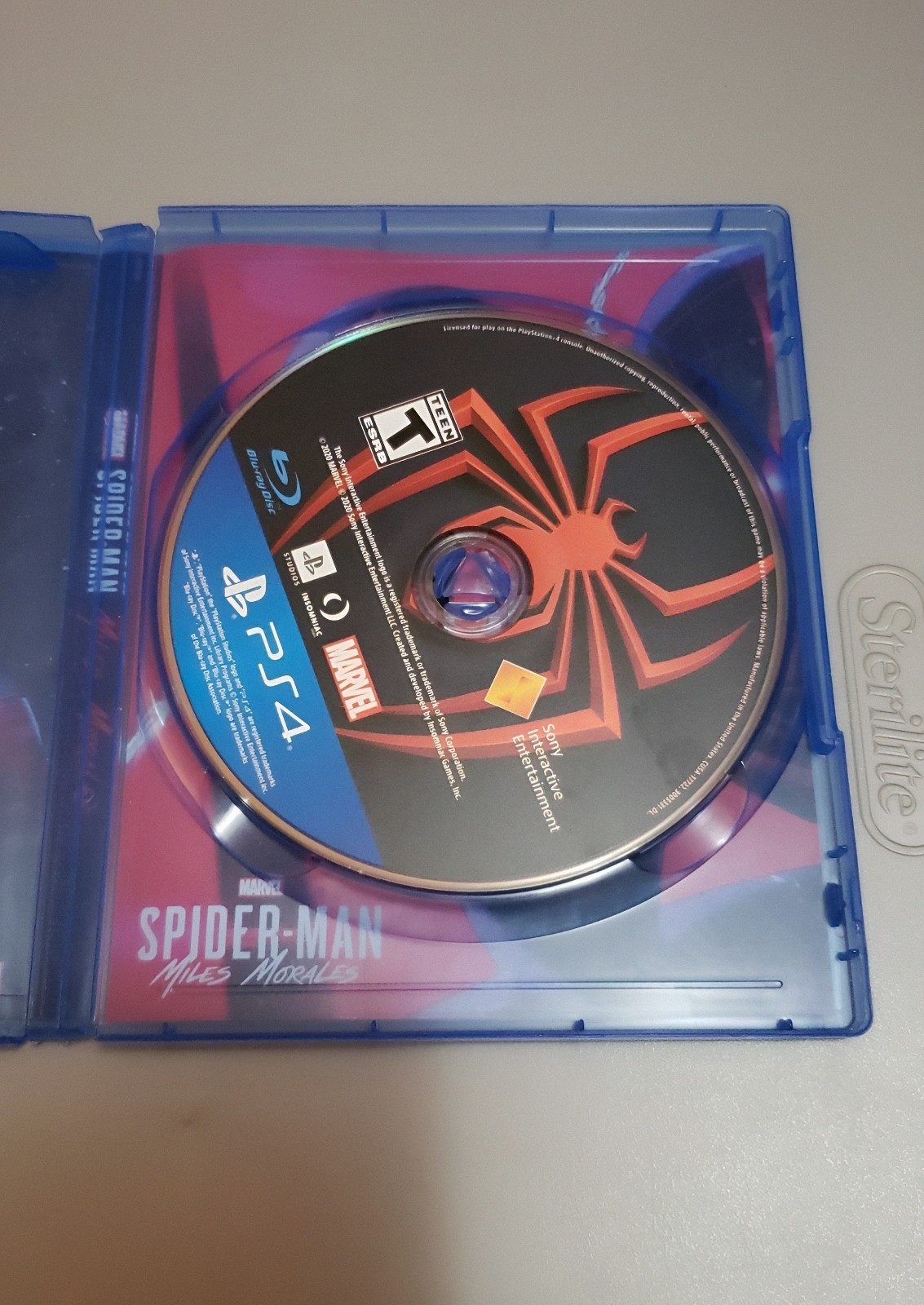 Marvel Spider-Man and Marvel Spider-Man Miles Morales PS4 CIB Tested & Works