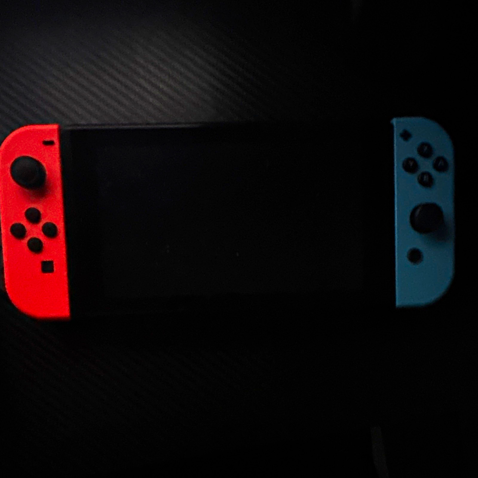 Nintendo Switch Console w/ Red & Blue Joy-Con Controllers