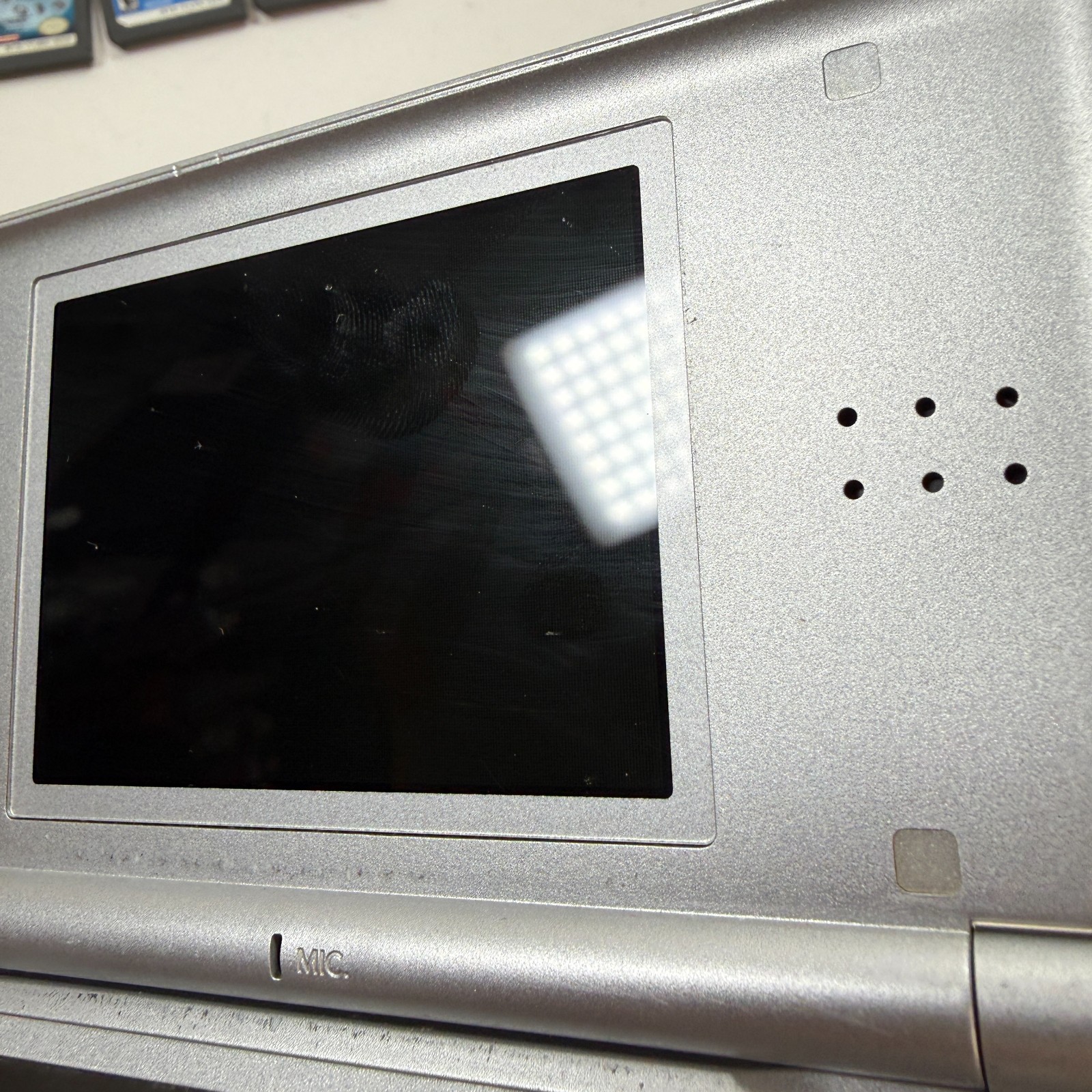 Nintendo DS Lite USG-001 Silver Handheld Console 4 Games + Charger