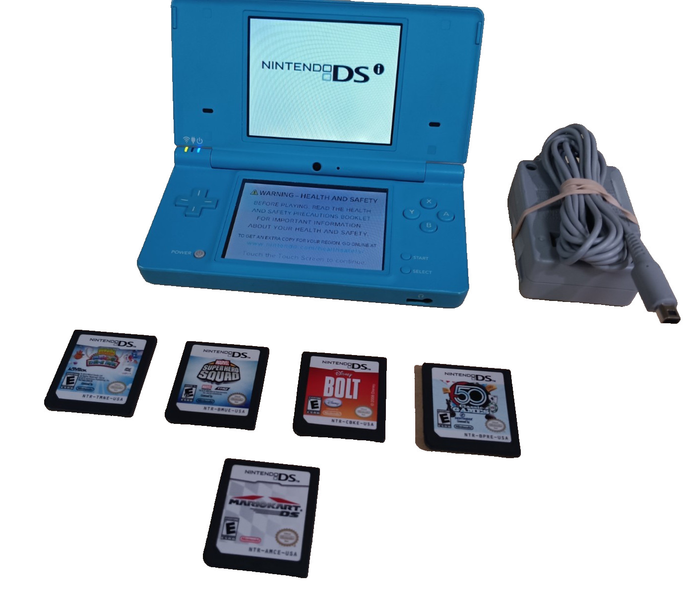 Nintendo DSi light blue console bundle w/ 5 games & charger- Tested