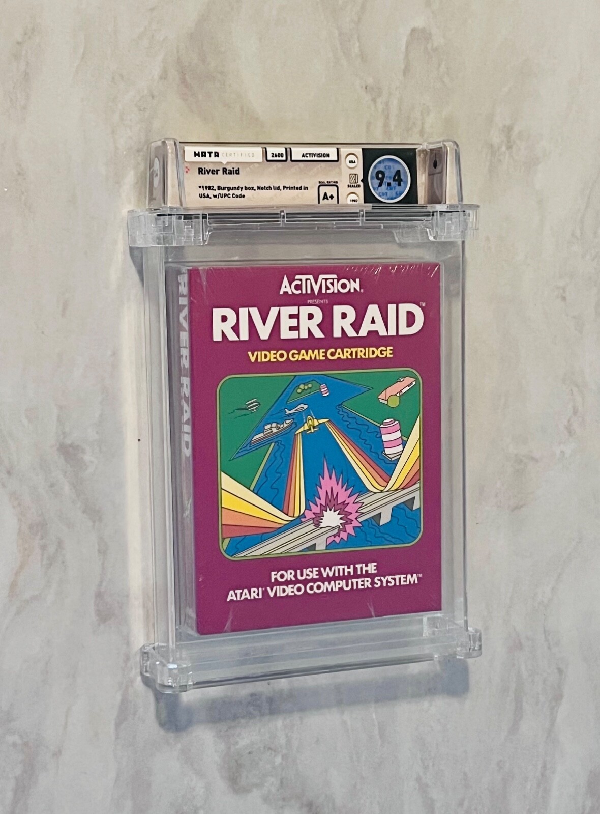 River Raid Atari 2600 9.4 A+ WATA CGC Burgundy Box