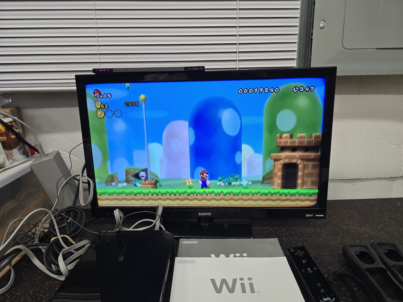 Nintendo Wii Game System RVL-101(USA) Black Bundle w/ Motion Plus & Super Mario