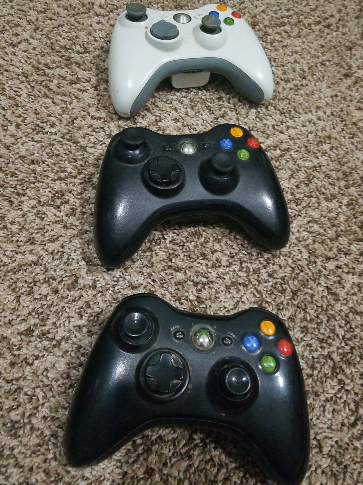Xbox And Wii Remotes As Is Of For Parts not sure if they work or not no backs