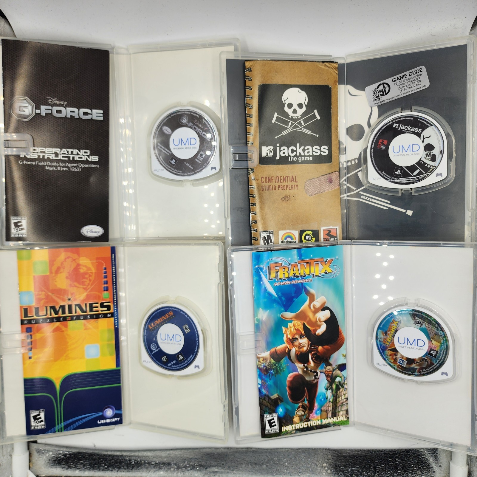 Lot of 16 Assorted PSP UMD Games w/ Manuals *pre-owned