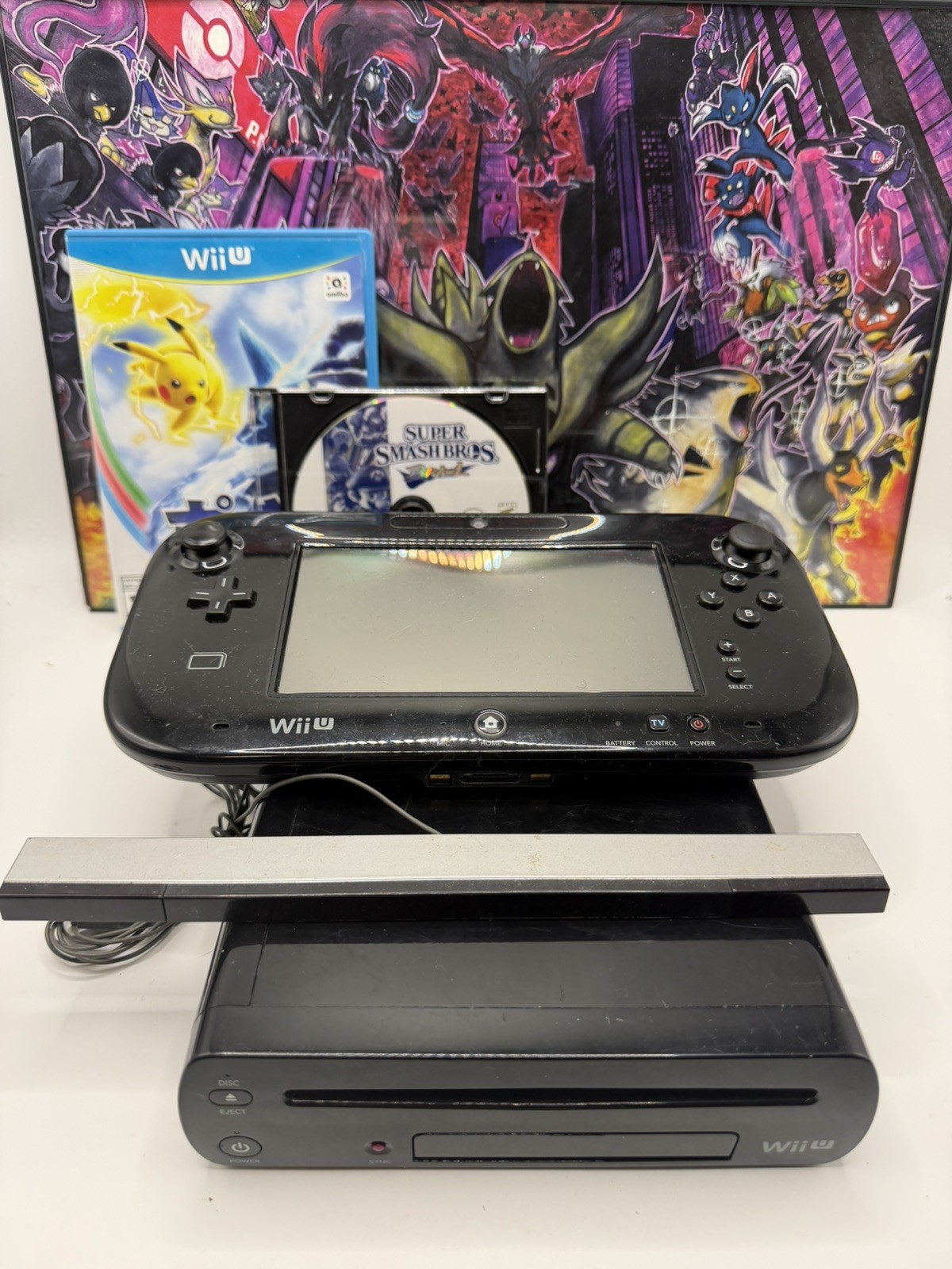 Nintendo Wii U Gamepad Console and 2 games read description