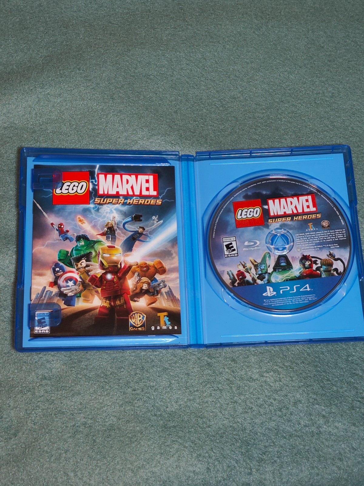 Warner Bros LEGO Marvel Super Heroes PS4 With Case Used Tested Minor Box Damage