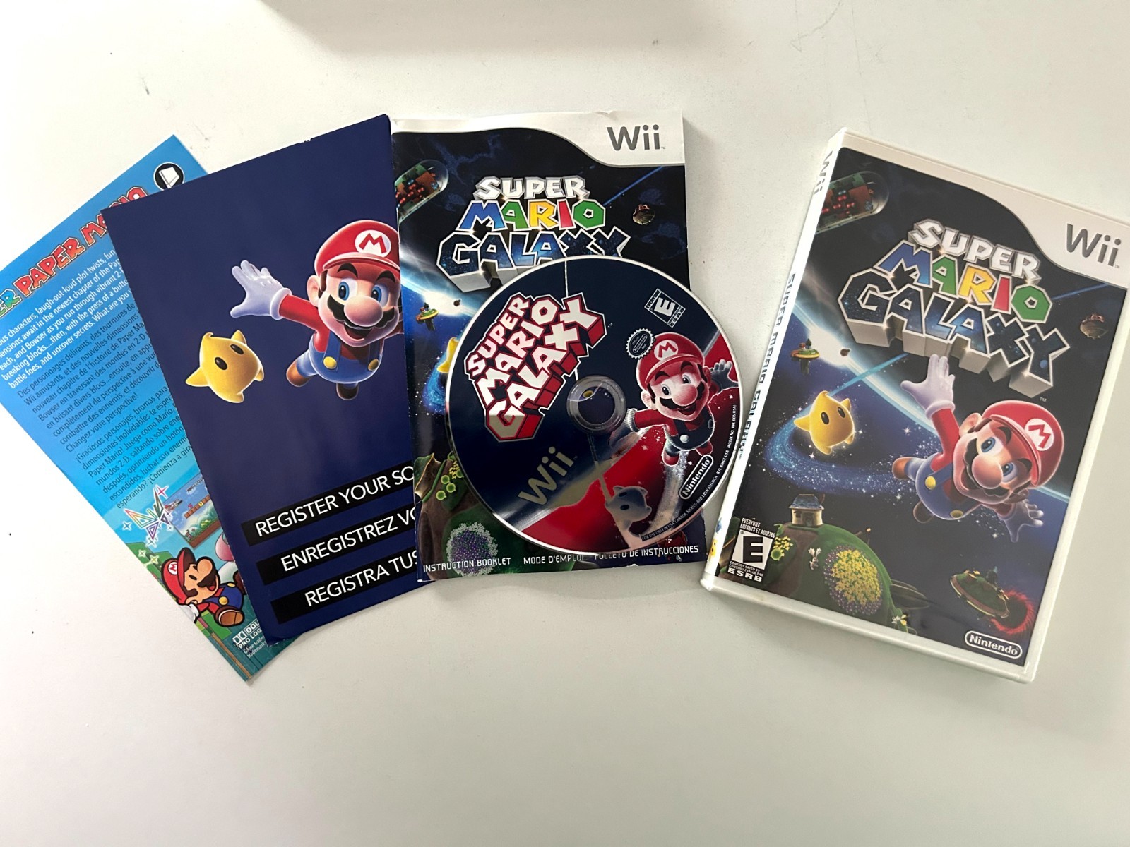Nintendo Wii Super Mario Galaxy 1 and 2 Bundle with Manual and Inserts Tested