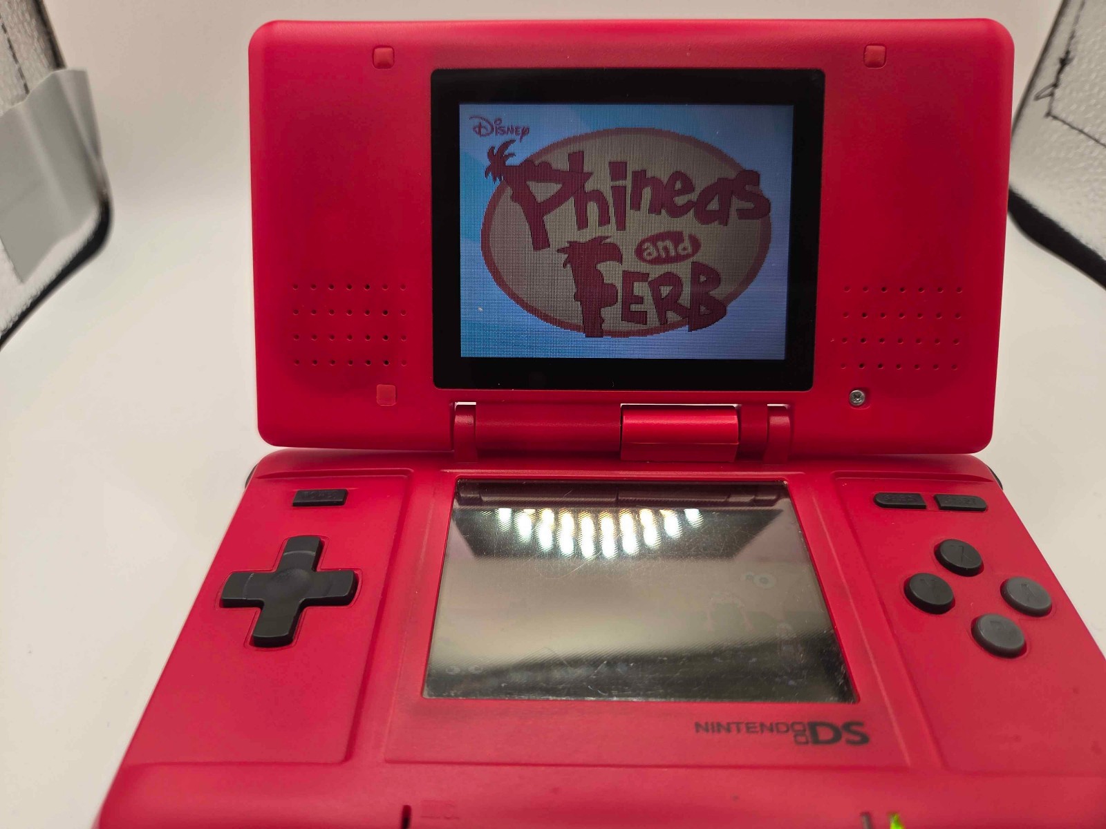 Nintendo DS Original Model NTR-001 Red USED Comes w/ Phineas and Ferb Game