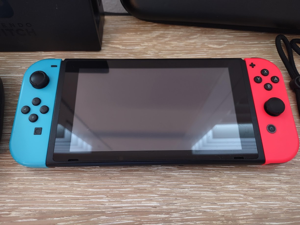 Nintendo Switch 32GB Handheld Console System – Neon Red/Neon Blue LOT Bundle