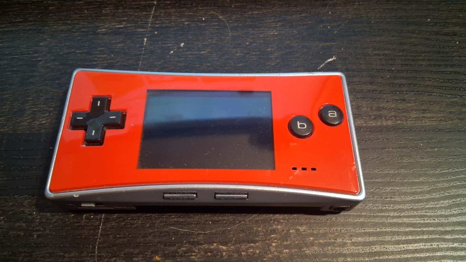 Gameboy Micro (Red Faceplate) with 3rd Party Charger (New Battery Installed)