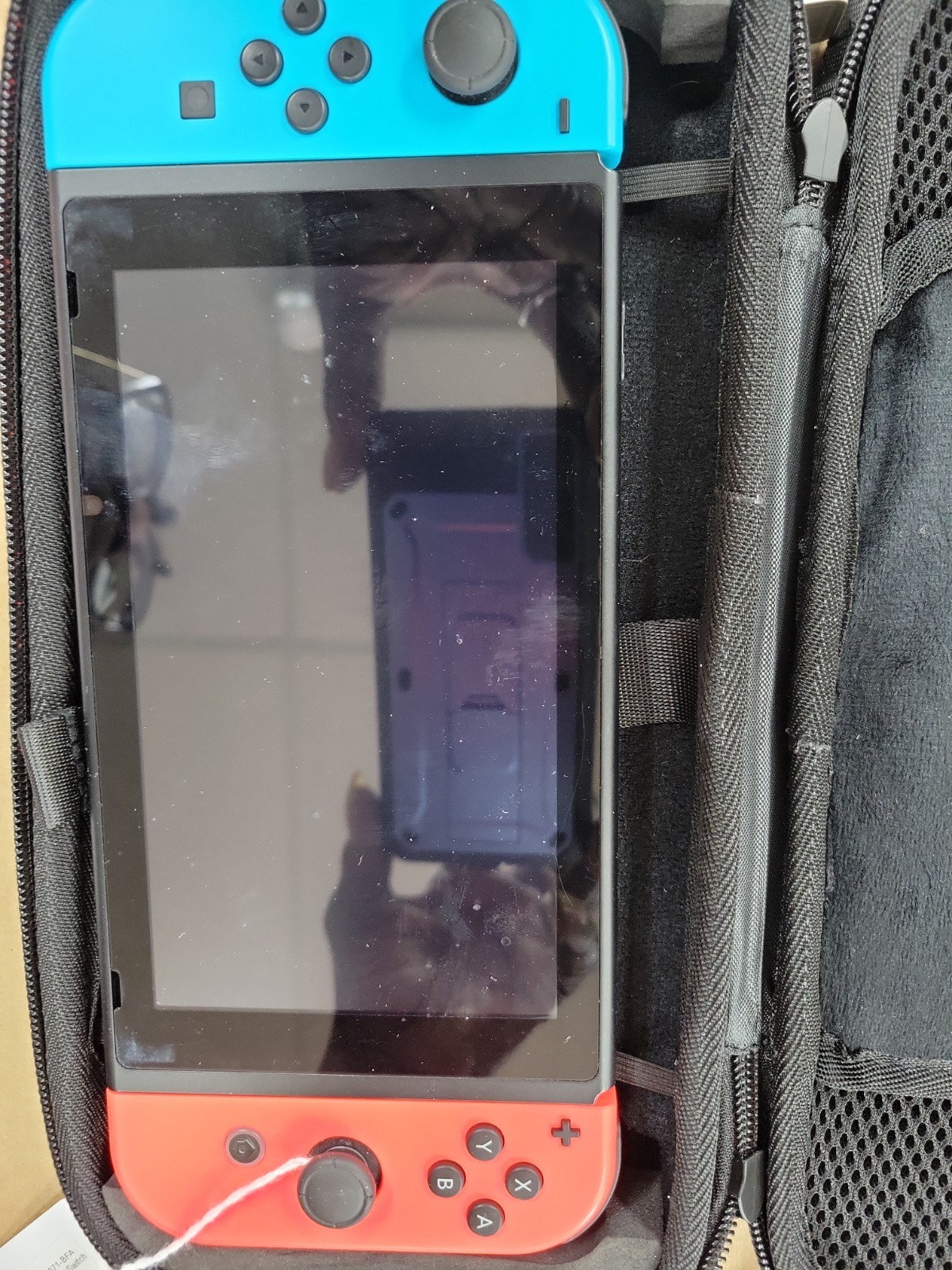 NINTENDO SWITCH HANDHELD: MODEL HAC-001 (-01) RED/BLUE, (B33004746)