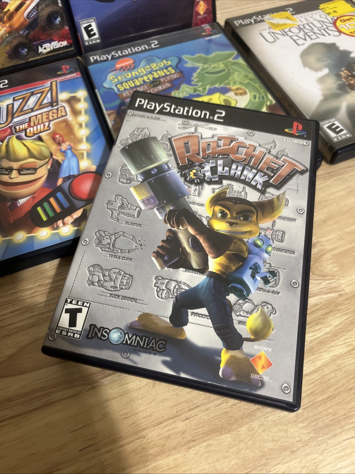 PS2 Game Lot Of 8 PlayStation 2 Crash Ratchet, Gran Turismo 3, Guitar Hero, Etc