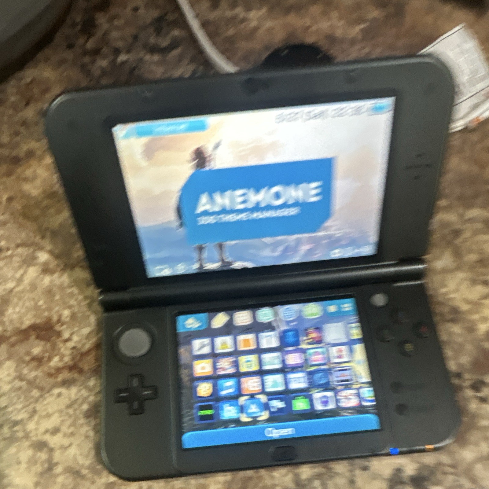 Nintendo New 3DS XL Handheld System 128 GBsd card charger and stylus included