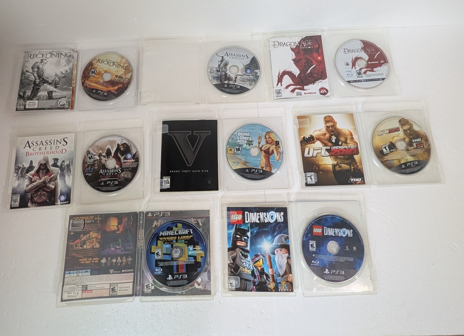 Sony PS3 Super Slim 500GB White Console Bundle 2 OEM Sony Controllers 8 Games…
