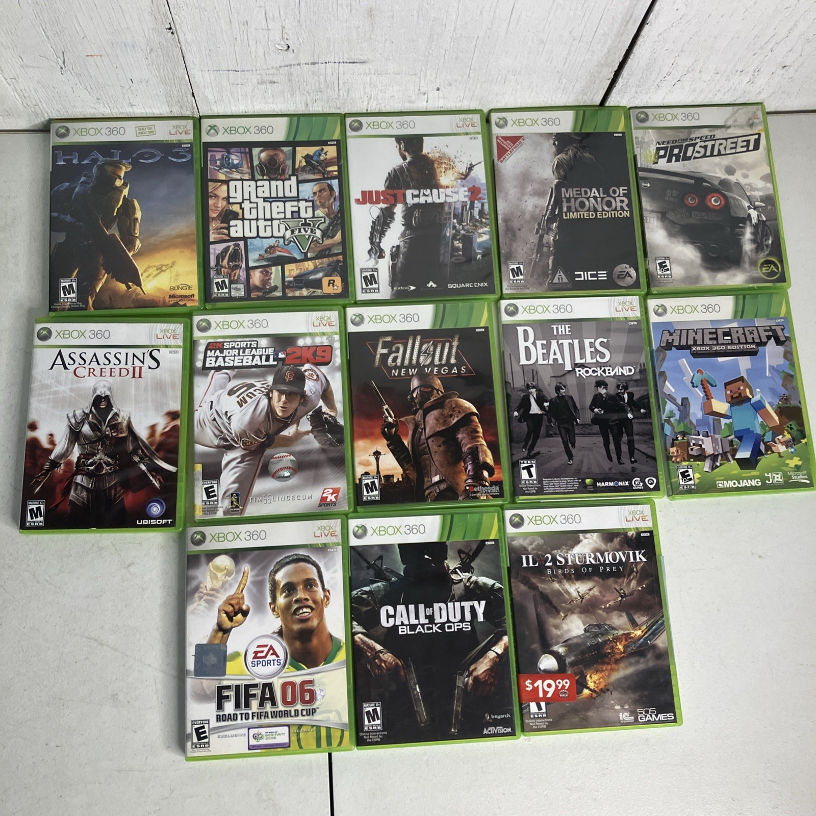 Microsoft Xbox 360 E 500GB 1538 Bundle 2 Controllers 25 Games GTA V HALO FALLOUT