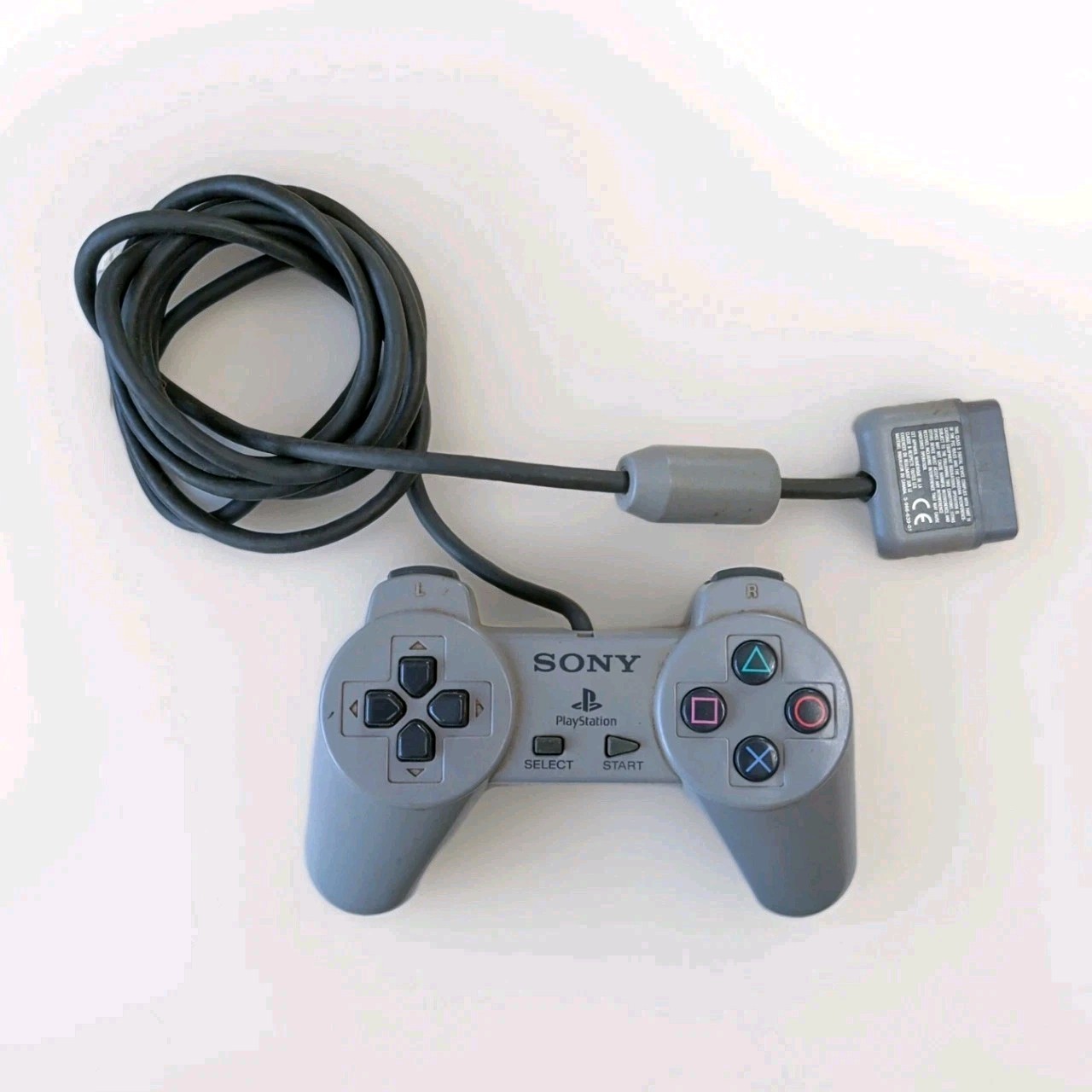 Sony PlayStation 1 Light Gray Controllers (x2) – Untested